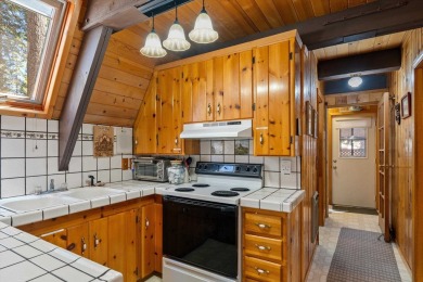 Idyllic Lake Almanor A-Frame Cabin - A Hidden Gem in the Sierras on Bailey Creek Golf Course in California - for sale on GolfHomes.com, golf home, golf lot
