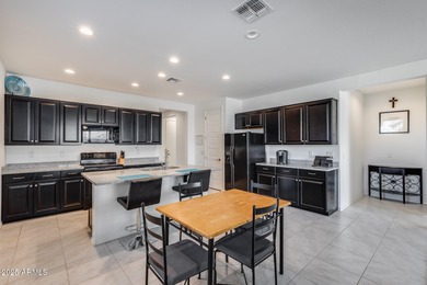 Modern golf course living with 3-car garage and resort-style on Verrado Golf Club  in Arizona - for sale on GolfHomes.com, golf home, golf lot