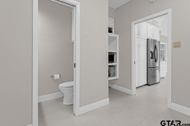 This beautifully updated home strikes that perfect balance on Hide-A-Way Lake Golf Course in Texas - for sale on GolfHomes.com, golf home, golf lot