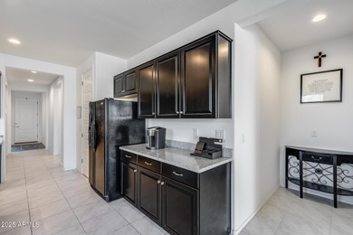 Modern golf course living with 3-car garage and resort-style on Verrado Golf Club  in Arizona - for sale on GolfHomes.com, golf home, golf lot