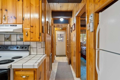 Idyllic Lake Almanor A-Frame Cabin - A Hidden Gem in the Sierras on Bailey Creek Golf Course in California - for sale on GolfHomes.com, golf home, golf lot