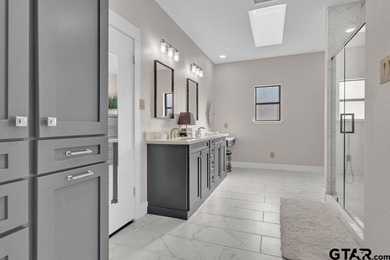 This beautifully updated home strikes that perfect balance on Hide-A-Way Lake Golf Course in Texas - for sale on GolfHomes.com, golf home, golf lot