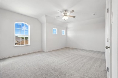 This impressive Magnolia floor plan by Brightland Homes boldly on Lake Arlington Golf Course in Texas - for sale on GolfHomes.com, golf home, golf lot