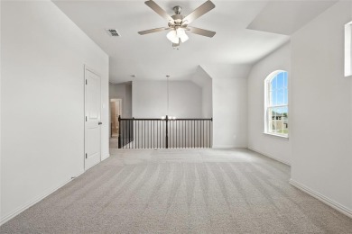 This impressive Magnolia floor plan by Brightland Homes boldly on Lake Arlington Golf Course in Texas - for sale on GolfHomes.com, golf home, golf lot