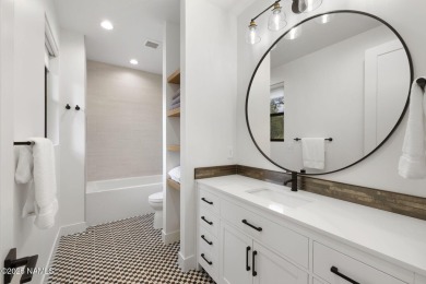 Nestled on 2.35 wooded acres in a tranquil cul-de-sac in Forest on Forest Highlands Golf Club - The Canyon in Arizona - for sale on GolfHomes.com, golf home, golf lot