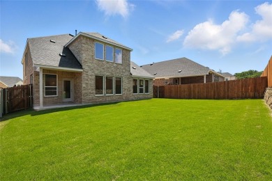 This impressive Magnolia floor plan by Brightland Homes boldly on Lake Arlington Golf Course in Texas - for sale on GolfHomes.com, golf home, golf lot