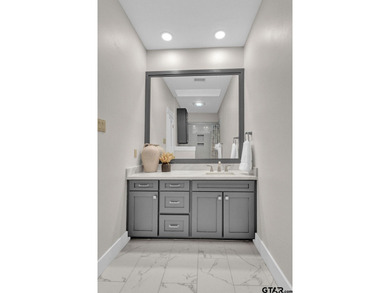 This beautifully updated home strikes that perfect balance on Hide-A-Way Lake Golf Course in Texas - for sale on GolfHomes.com, golf home, golf lot