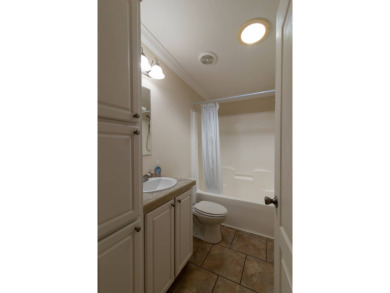 MOTIVATED SELLER!!! A comparable park model (lot 1447, 1,568 sq on Lily Lake Golf and RV Resort in Florida - for sale on GolfHomes.com, golf home, golf lot