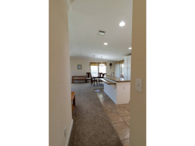 MOTIVATED SELLER!!! A comparable park model (lot 1447, 1,568 sq on Lily Lake Golf and RV Resort in Florida - for sale on GolfHomes.com, golf home, golf lot