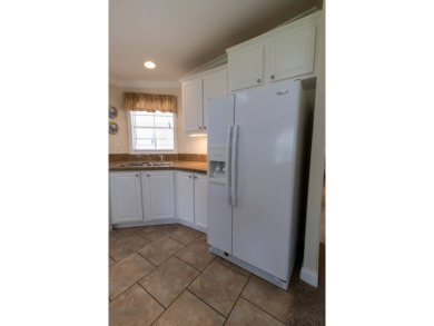 MOTIVATED SELLER!!! A comparable park model (lot 1447, 1,568 sq on Lily Lake Golf and RV Resort in Florida - for sale on GolfHomes.com, golf home, golf lot