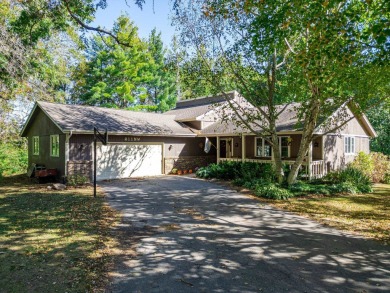 This spacious quad-level home is nestled on a double wooded lot on Savannah Oaks Golf Club of Candlewick Lake in Illinois - for sale on GolfHomes.com, golf home, golf lot