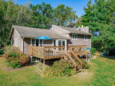 This spacious quad-level home is nestled on a double wooded lot on Savannah Oaks Golf Club of Candlewick Lake in Illinois - for sale on GolfHomes.com, golf home, golf lot