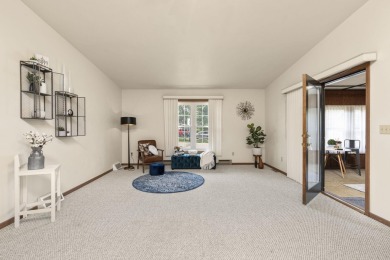 Welcome to effortless living in this beautifully maintained on Saddle Ridge Golf Club in Wisconsin - for sale on GolfHomes.com, golf home, golf lot