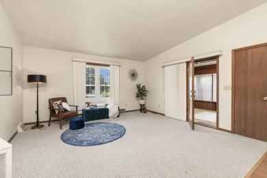 Welcome to effortless living in this beautifully maintained on Saddle Ridge Golf Club in Wisconsin - for sale on GolfHomes.com, golf home, golf lot