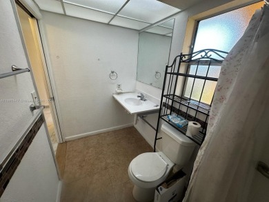 Move in Ready First Floor One Bedroom Apartment. Wheelchair on Sunrise Lakes Phase III in Florida - for sale on GolfHomes.com, golf home, golf lot