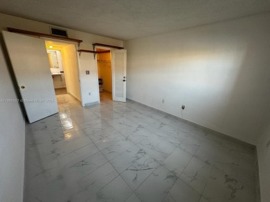 Move in Ready First Floor One Bedroom Apartment. Wheelchair on Sunrise Lakes Phase III in Florida - for sale on GolfHomes.com, golf home, golf lot