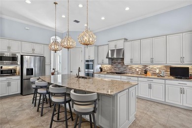 Welcome to 8667 Amour Ct. This beautiful golf membership home on Esplanade Golf and  Country Club in Florida - for sale on GolfHomes.com, golf home, golf lot