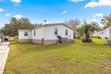 NO BOND, NO CDD! This home in The Villages is a must-see for on Orange Blossom Hills Golf and Country Club in Florida - for sale on GolfHomes.com, golf home, golf lot