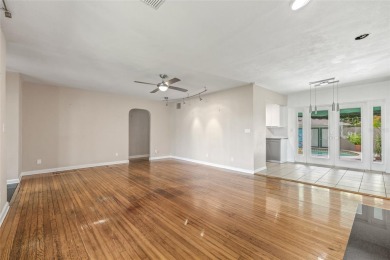 A must-see mid-century modern beauty with European flair located on The Renaisssance Vinoy Golf Club in Florida - for sale on GolfHomes.com, golf home, golf lot