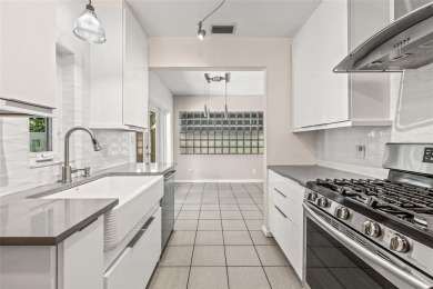 A must-see mid-century modern beauty with European flair located on The Renaisssance Vinoy Golf Club in Florida - for sale on GolfHomes.com, golf home, golf lot