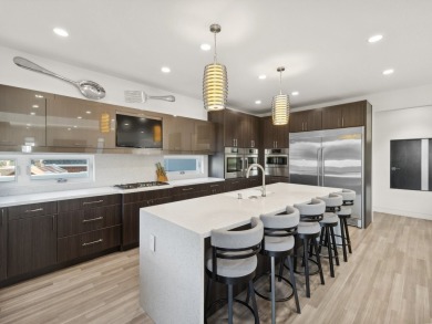 Check out this chic contemporary two story backing to a stocked on Des Moines Golf and Country Club in Iowa - for sale on GolfHomes.com, golf home, golf lot