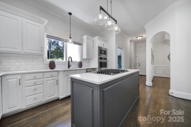 Ideally situated on a picturesque 1-acre lot in Lake Norman's on Trump National Golf Club Charlotte in North Carolina - for sale on GolfHomes.com, golf home, golf lot