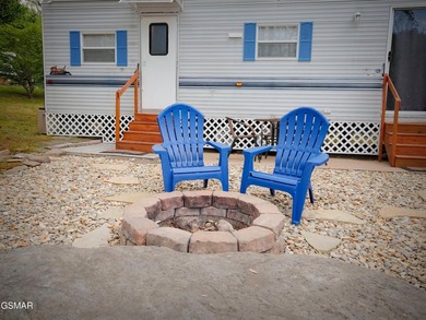 Perfectly landscaped large corner RV lot with both shade trees on Bent Creek Golf Course in Tennessee - for sale on GolfHomes.com, golf home, golf lot