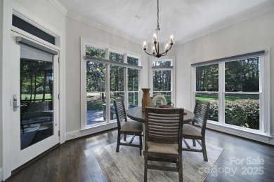 Ideally situated on a picturesque 1-acre lot in Lake Norman's on Trump National Golf Club Charlotte in North Carolina - for sale on GolfHomes.com, golf home, golf lot