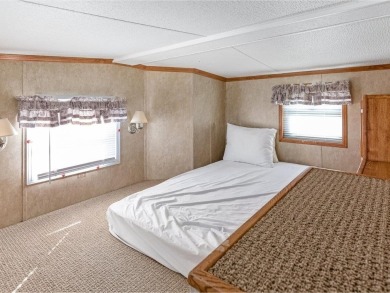 Charming 1-bedroom, 1 full bathroom cottage at beautiful Apple on Apple Island Golf Course At Apple Island Resort in Vermont - for sale on GolfHomes.com, golf home, golf lot