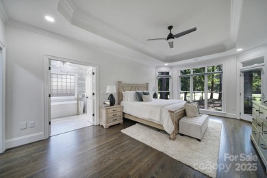 Ideally situated on a picturesque 1-acre lot in Lake Norman's on Trump National Golf Club Charlotte in North Carolina - for sale on GolfHomes.com, golf home, golf lot