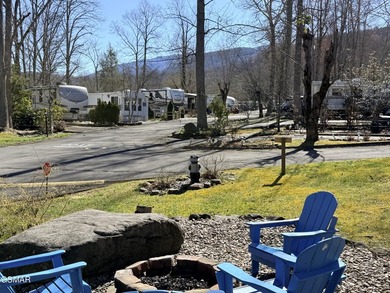 Perfectly landscaped large corner RV lot with both shade trees on Bent Creek Golf Course in Tennessee - for sale on GolfHomes.com, golf home, golf lot