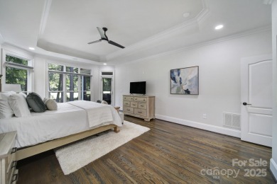 Ideally situated on a picturesque 1-acre lot in Lake Norman's on Trump National Golf Club Charlotte in North Carolina - for sale on GolfHomes.com, golf home, golf lot