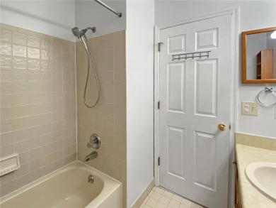 Experience the ease of low maintenance living in this bright and on Meadowbrook Golf Club in Florida - for sale on GolfHomes.com, golf home, golf lot