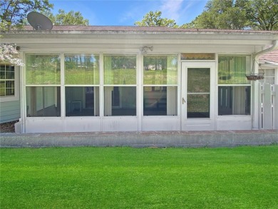 Experience the ease of low maintenance living in this bright and on Meadowbrook Golf Club in Florida - for sale on GolfHomes.com, golf home, golf lot