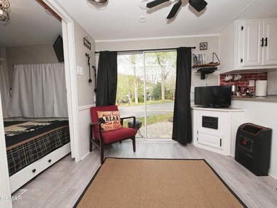 Perfectly landscaped large corner RV lot with both shade trees on Bent Creek Golf Course in Tennessee - for sale on GolfHomes.com, golf home, golf lot