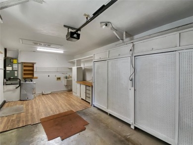 Experience the ease of low maintenance living in this bright and on Meadowbrook Golf Club in Florida - for sale on GolfHomes.com, golf home, golf lot