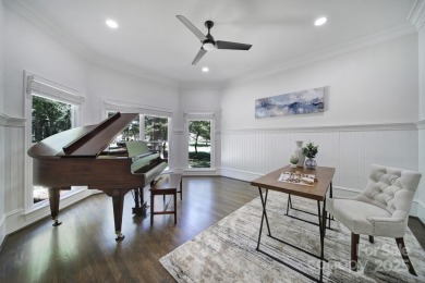 Ideally situated on a picturesque 1-acre lot in Lake Norman's on Trump National Golf Club Charlotte in North Carolina - for sale on GolfHomes.com, golf home, golf lot