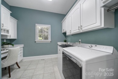 Ideally situated on a picturesque 1-acre lot in Lake Norman's on Trump National Golf Club Charlotte in North Carolina - for sale on GolfHomes.com, golf home, golf lot