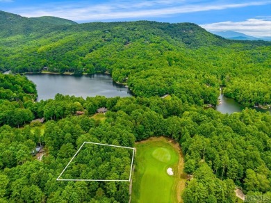 This .75 acre gently sloping golf course lot overlooks #3 green on Lake Toxaway Country Club in North Carolina - for sale on GolfHomes.com, golf home, golf lot