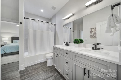 Ideally situated on a picturesque 1-acre lot in Lake Norman's on Trump National Golf Club Charlotte in North Carolina - for sale on GolfHomes.com, golf home, golf lot