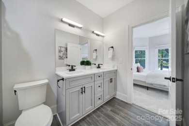 Ideally situated on a picturesque 1-acre lot in Lake Norman's on Trump National Golf Club Charlotte in North Carolina - for sale on GolfHomes.com, golf home, golf lot