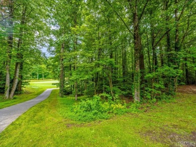 This .75 acre gently sloping golf course lot overlooks #3 green on Lake Toxaway Country Club in North Carolina - for sale on GolfHomes.com, golf home, golf lot