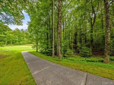 This .75 acre gently sloping golf course lot overlooks #3 green on Lake Toxaway Country Club in North Carolina - for sale on GolfHomes.com, golf home, golf lot