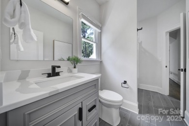 Ideally situated on a picturesque 1-acre lot in Lake Norman's on Trump National Golf Club Charlotte in North Carolina - for sale on GolfHomes.com, golf home, golf lot