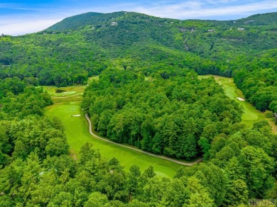 This .75 acre gently sloping golf course lot overlooks #3 green on Lake Toxaway Country Club in North Carolina - for sale on GolfHomes.com, golf home, golf lot