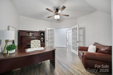 Ideally situated on a picturesque 1-acre lot in Lake Norman's on Trump National Golf Club Charlotte in North Carolina - for sale on GolfHomes.com, golf home, golf lot