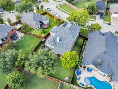 Stunning brick 2 story Sachse home in Woodbridge on a large on Woodbridge Golf Club in Texas - for sale on GolfHomes.com, golf home, golf lot