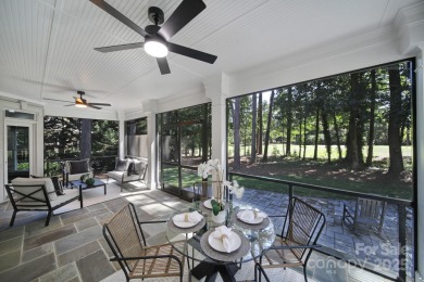 Ideally situated on a picturesque 1-acre lot in Lake Norman's on Trump National Golf Club Charlotte in North Carolina - for sale on GolfHomes.com, golf home, golf lot