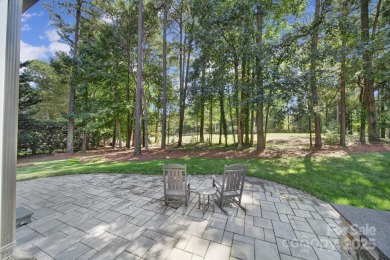 Ideally situated on a picturesque 1-acre lot in Lake Norman's on Trump National Golf Club Charlotte in North Carolina - for sale on GolfHomes.com, golf home, golf lot