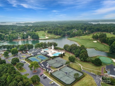 Ideally situated on a picturesque 1-acre lot in Lake Norman's on Trump National Golf Club Charlotte in North Carolina - for sale on GolfHomes.com, golf home, golf lot